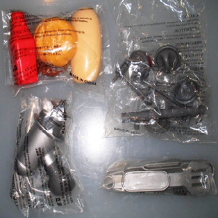 Hardware Pack: Faucet Assembly (P.L). Clicker Knob (E). Clicker Button (M). Utensil Hanger (G). Grill Handle (Q). Hamburger Patty. Hamburger Bun Top and Bottom. Hot Dog. Hot Dog Bun. Spatula. Tongs. Ketchup Bottle